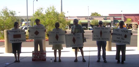 NDE members vigil outside the Atomic Testing Museum