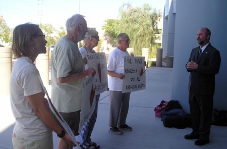 Museum Bill Johnson greets NDE members.